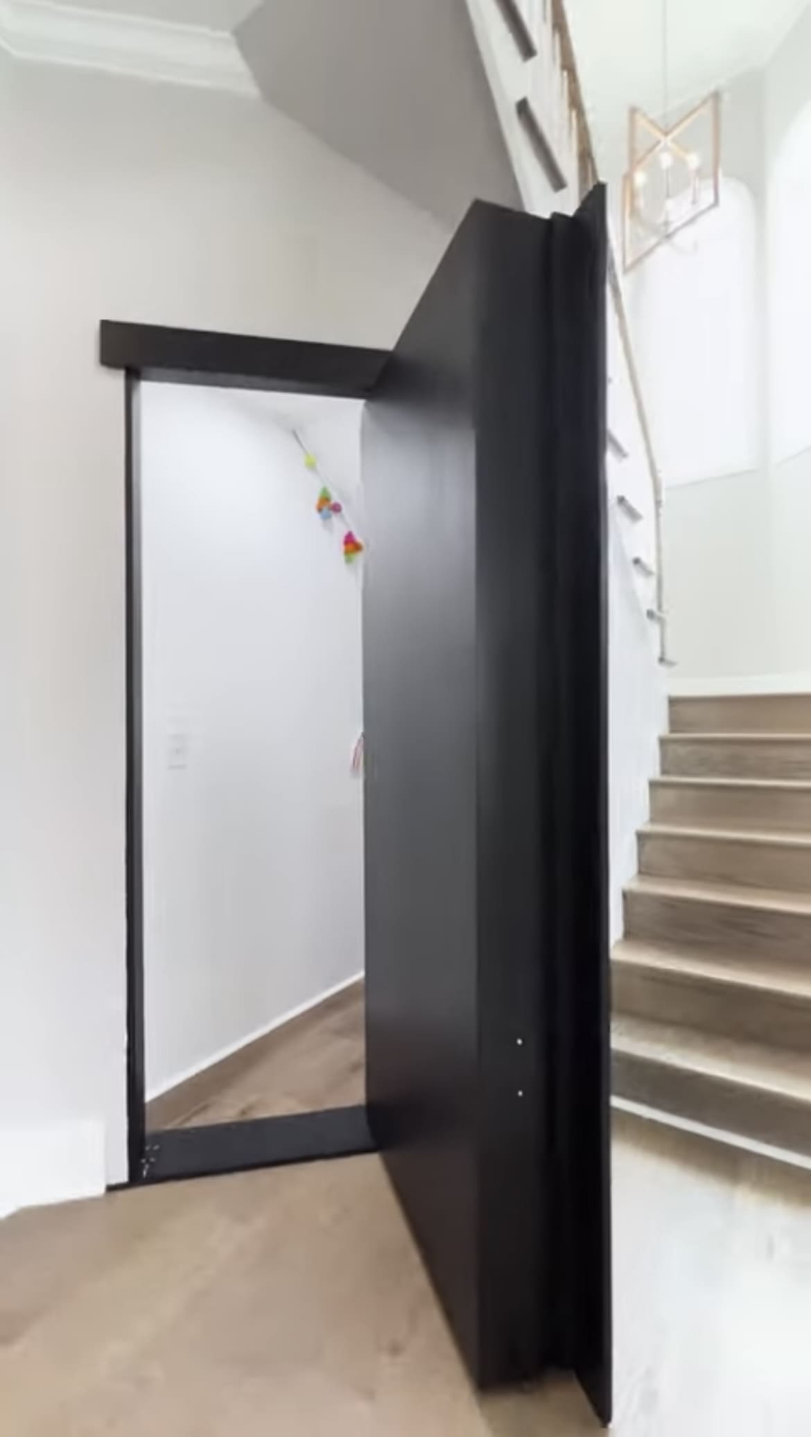 A door opened to the top of stairs.